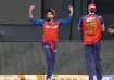 Shreyas Iyer and Xavier Bartlett after the completion of the catch