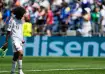 Qatar's Akram Afif leaves the field following his team's