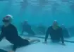 40 Indian Navy submariners perform yoga under water.