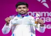 Raja Muthupandi poses after winning a silver medal during