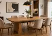 1. Warm oak table with sculptural pedestal legs: A warm oak
