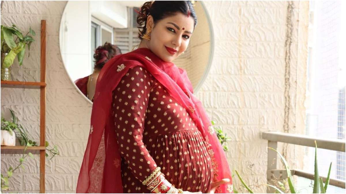 Pregnant Debina Bonnerjee looks resplendent in red anarkali suit