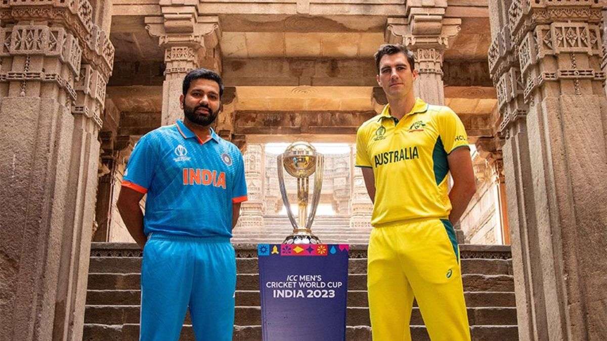 Rohit Sharma and Pat Cummins with the World Cup 2023 trophy