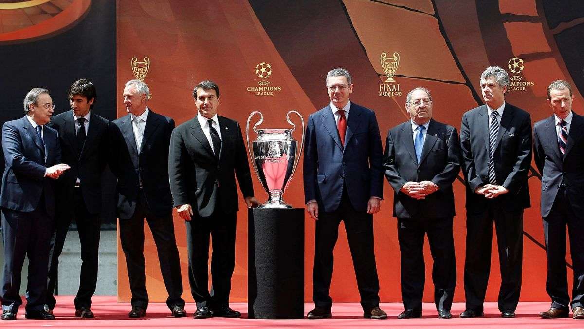 European club owners with UEFA Champions League Trophy