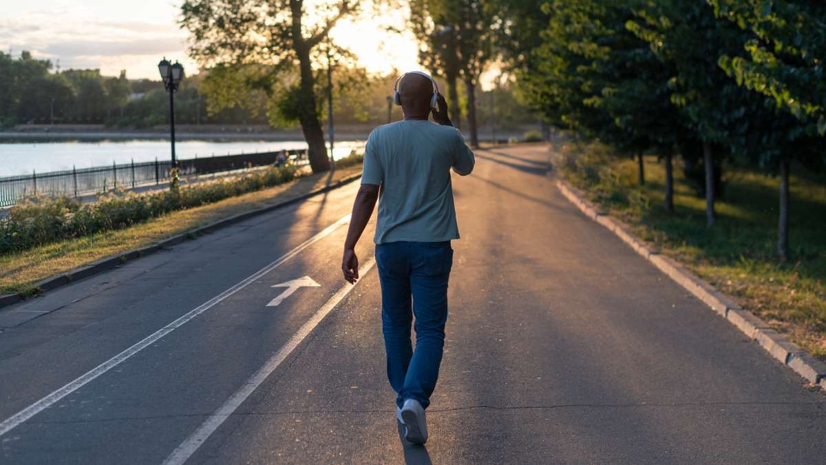 Man listening to music while walking