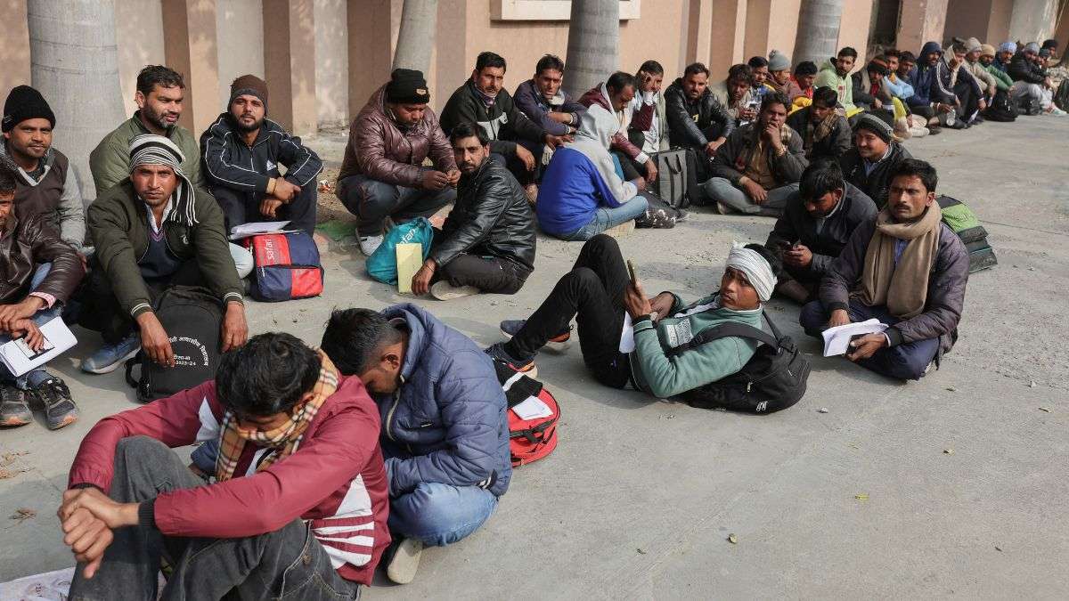Skilled workers wait for their interview and skill test at a Haryana state government recruitment dr