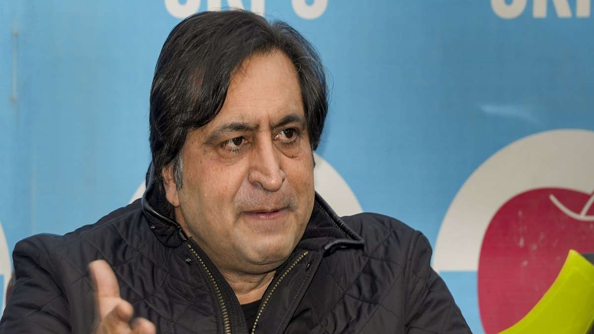 Peoples Conference President Sajjad Lone addresses a press