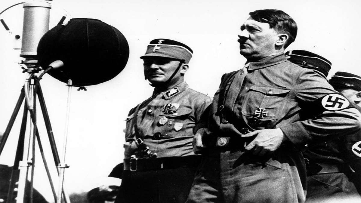 German chancellor Adolf Hitler speaks to 30,000 uniformed Nazi stormtroopers at Kiel, Germany.