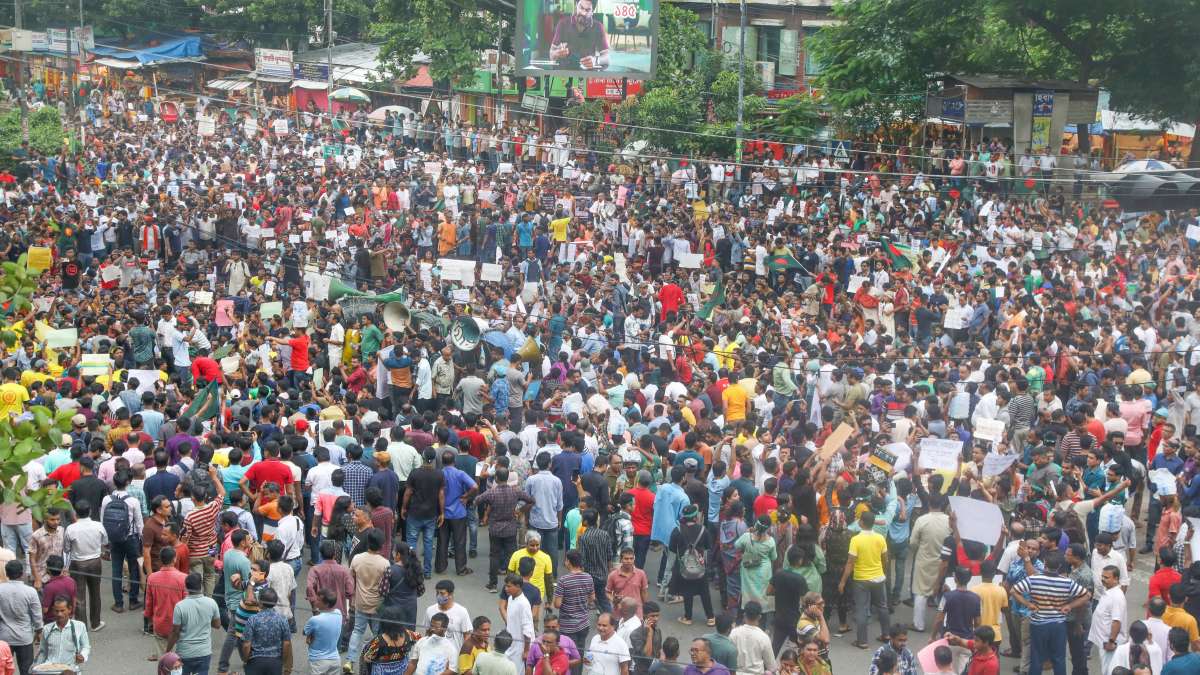 People gather on road amid violent protests in Bangladesh