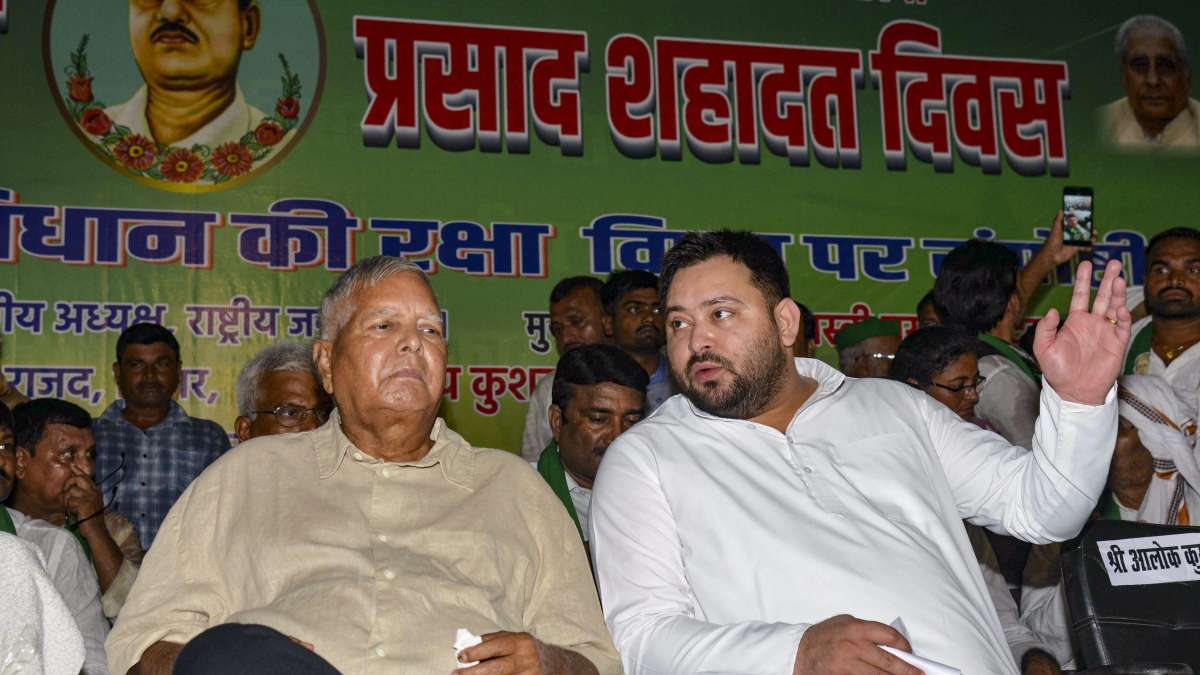 RJD chief Lalu Prasad Yadav and his son Tejashwi Yadav