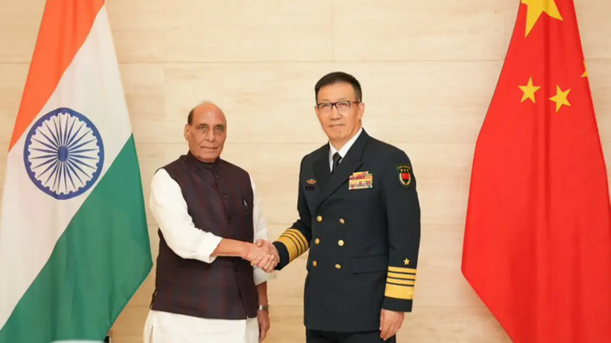 Rajnath Singh with his Chinese counterpart Admiral Dong Jun