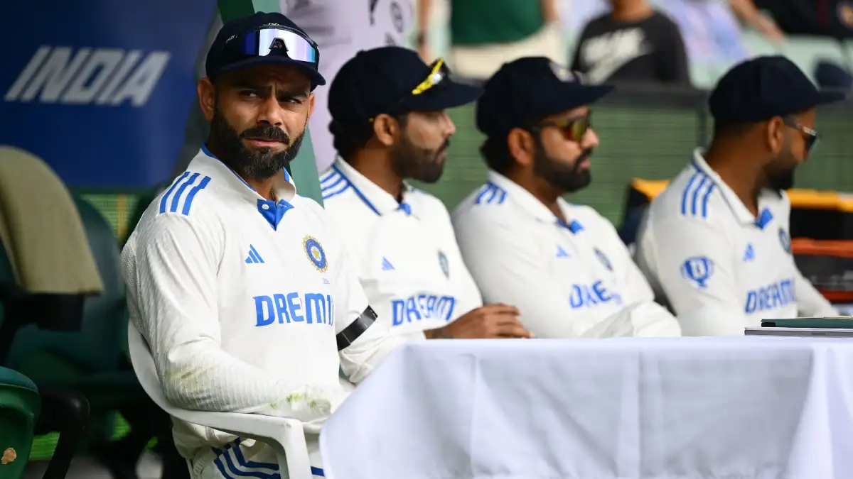 The Indian players in the dugout before getting on the