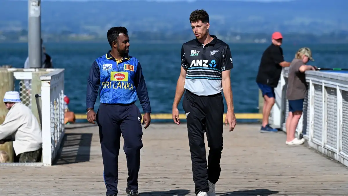 Charith Asalanka and Mitchell Santner.