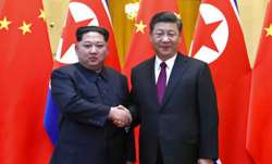 North Korean leader Kim Jong Un, left, and Chinese