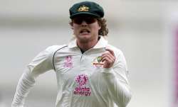 Australia's Will Pucovski runs to field the ball during