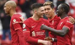 Liverpool's Sadio Mane, right, celebrates scoring his sides