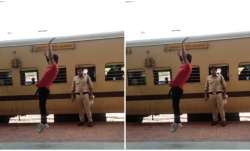 A man performing backflips at the railway station