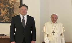 Tesla CEO Elon Musk (left) with Pope Francis (right).  