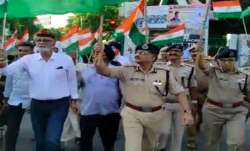 Several people were seen walking with the tricolor on the