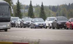Cars coming from Russia wait in lines at the Vaalimaa