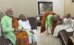Prime Minister Narendra Modi meets mother Heeraben Modi, in