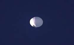 A high-altitude balloon floats over Billings, Mont., on