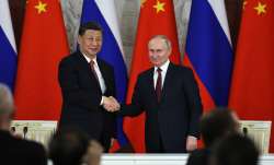 Russian President Vladimir Putin with his Chinese