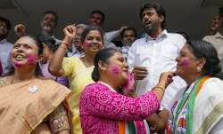 Congress leaders and workers celebrate at the party office