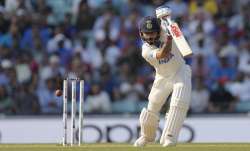 Virat Kohli with his cover drive