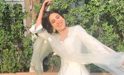Sara Ali Khan looks elegant in a  white salwar suit.