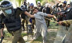 Scuffle between protestors and security personnel in Pakistan.