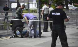 A person detained after he fired four shots at Slovak PM