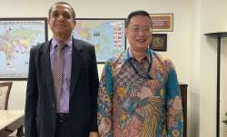 MEA Additional Secretary (South) Ravi Shankar (L) with Singapore High Commissioner Simon Wong (R)