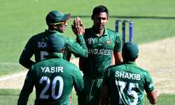 Mustafizur Rahman celebrates a wicket with Shakib Al Hasan.
