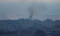 Smoke billows from an Israeli strike near Beirut's Rafic