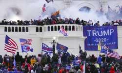 Rioters storm the West Front of the US Capitol January 6, 2021, in Washington