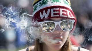 Thousands sent up a cheer and smoked marijuana at the