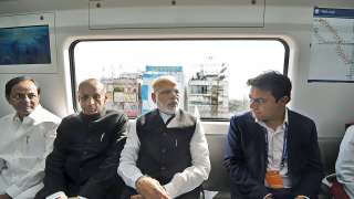 PM Narendra Modi, accompanied by Telangana Governor ESL