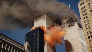 Smoke billows from one of the towers of the World Trade