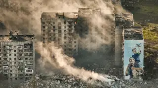 Smoke rises from buildings in Bakhmut, Ukraine, the site of