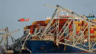 A container ship smashed into a four-lane bridge i