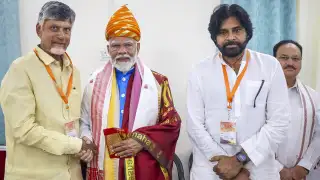 Prime Minister Narendra Modi is greeted by TDP president N
