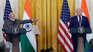 PM Modi met Donald Trump at the White House with both