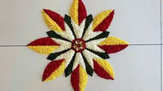 Pookalam is a vibrant floral carpet created on the ground