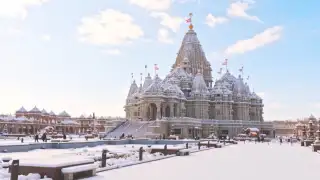 The first snowfall adds a calm, wintry layer to the BAPS