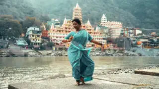 Scenic view of Rishikesh with river, temples 