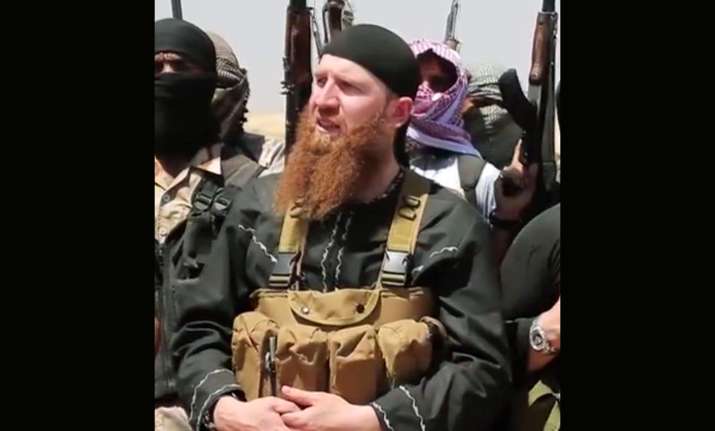File photo of Omar al-Shishani standing next to the group's