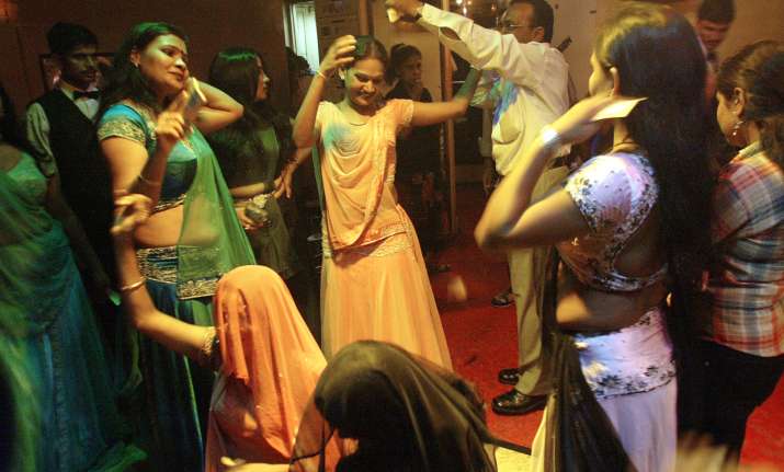 Showering money on girls in dance bars against dignity and
