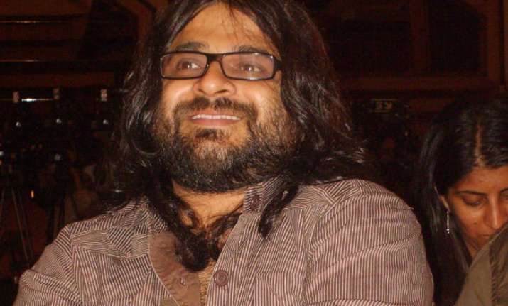 Pritam reveals what it is like working with Karan Johar