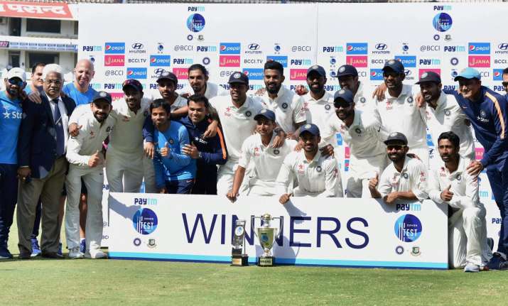 Indian cricket team and support staff after defeating
